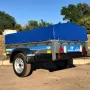 Автомобильный прицеп Кремень стандарт плюс (2,5х1,3  50 м) с тентом 70 см