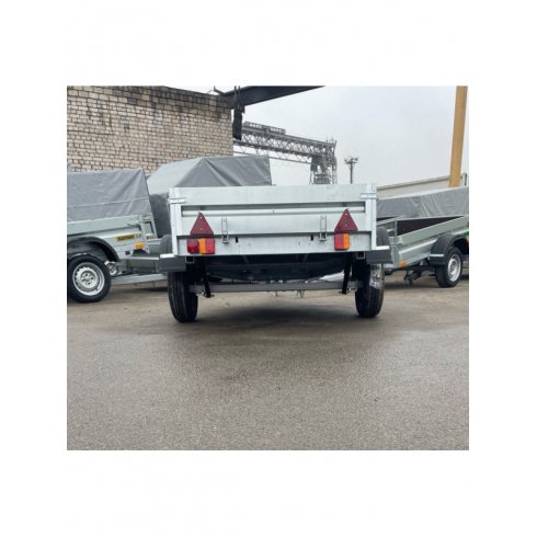 Автомобильный оцинкованный самосвальный прицеп Новатор PROFI  1.85х1.3м борт 315мм